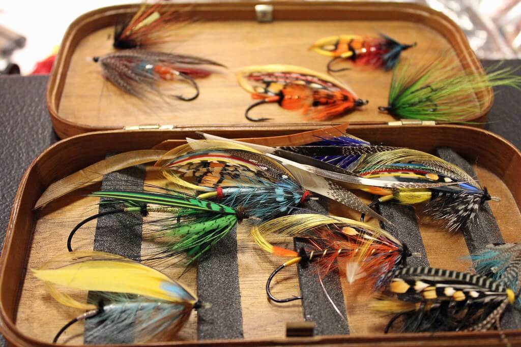 Open fly box with various large flies inside
