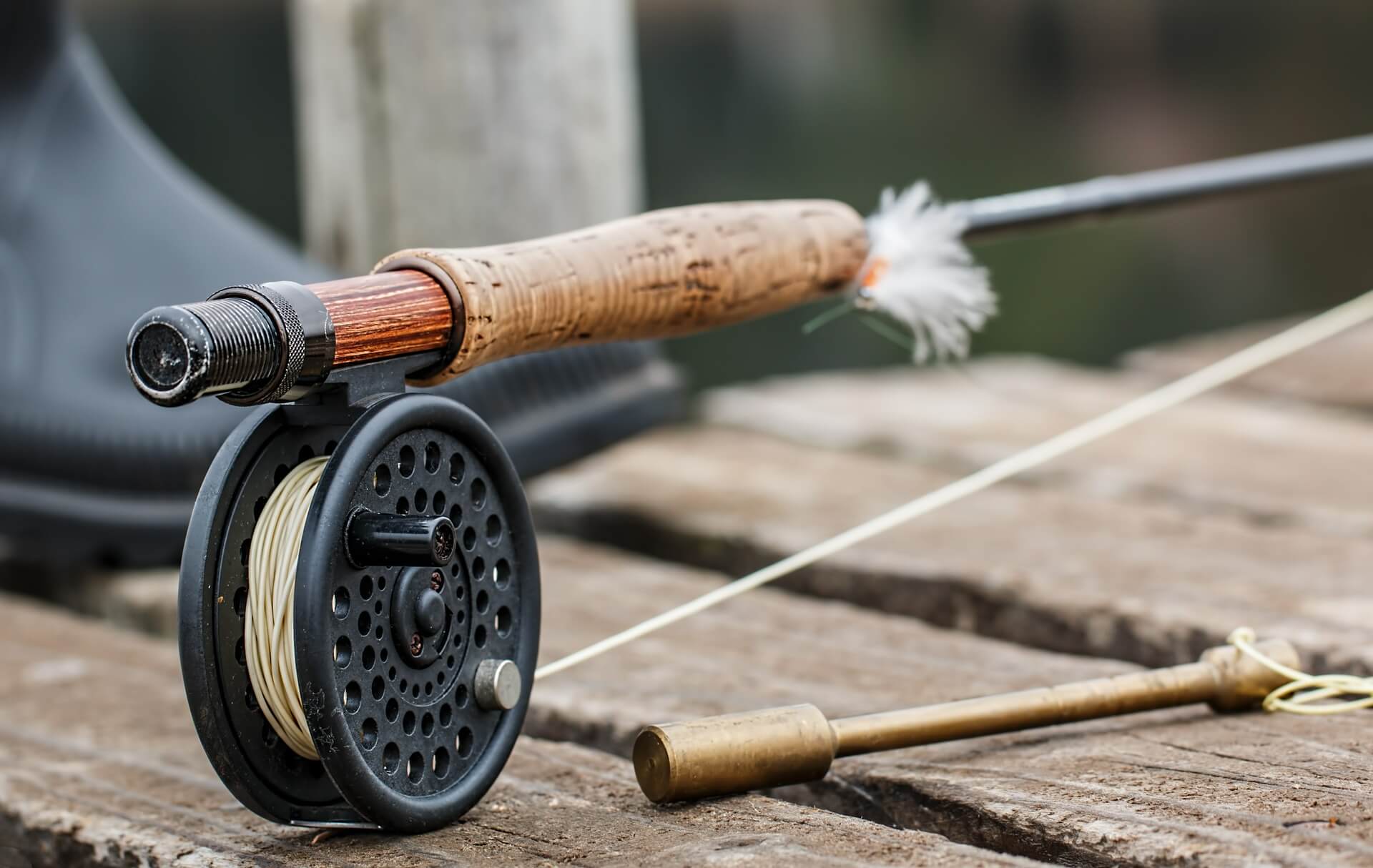 up close shot of a Fly Rod sitting on a dock