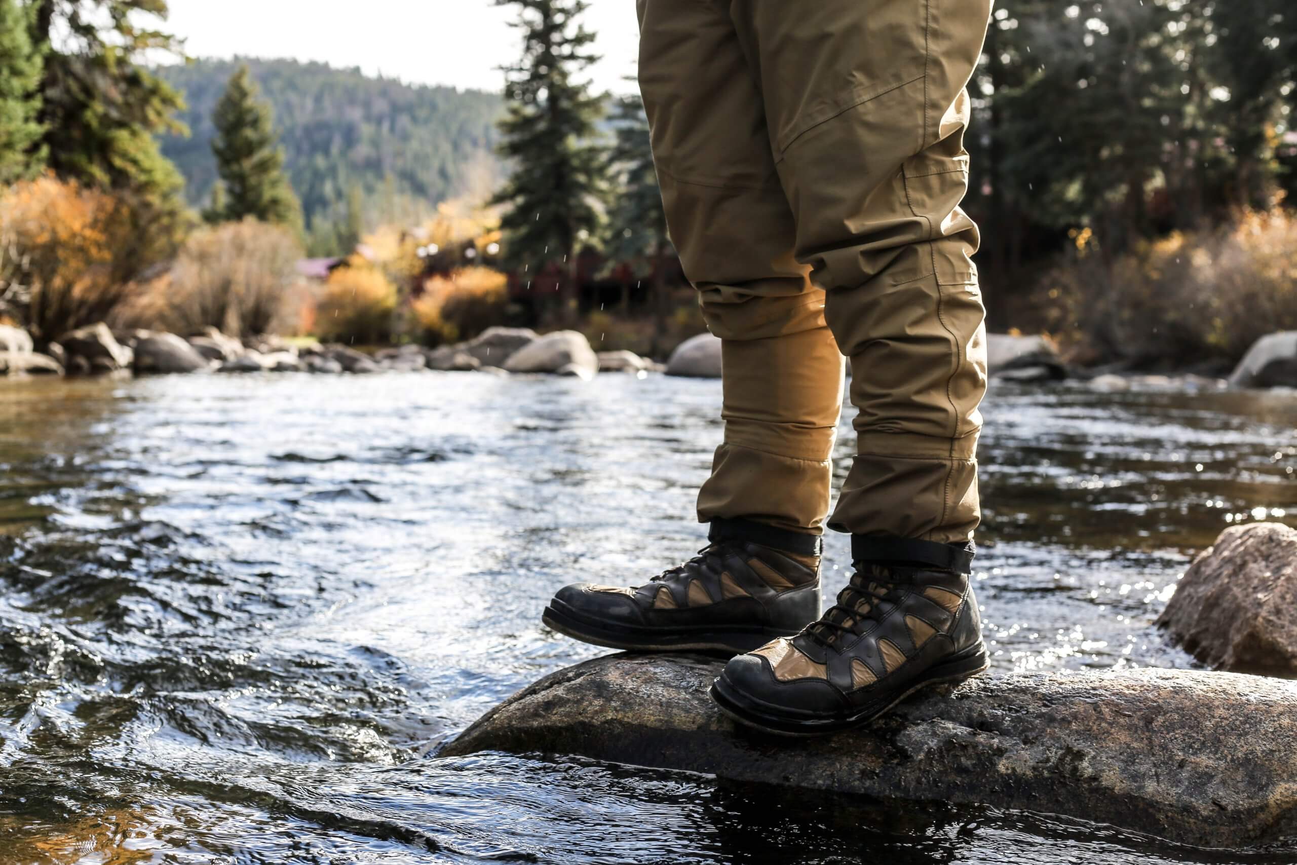 fishing boots in stream