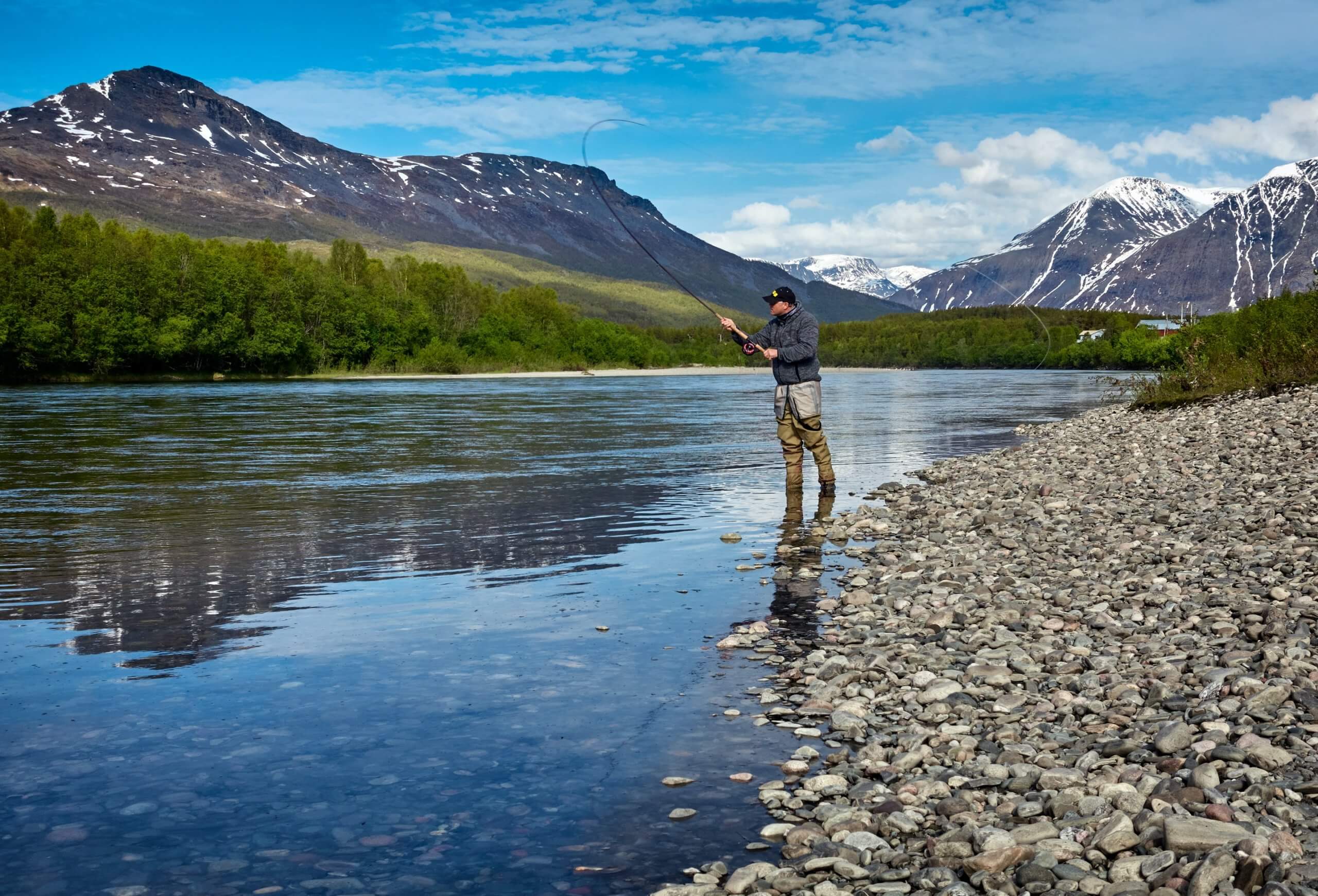 fly fishing stream mountains